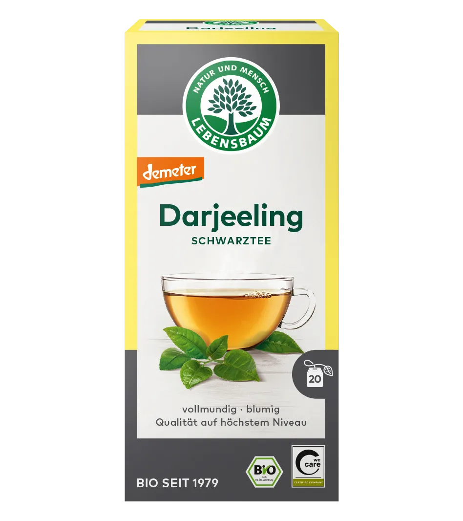 Lebensbaum Darjeeling Schwarztee Bio, 20 Teebeutel, goldgelbe Tasse mit grünen Blättern, gelbe Verpackung