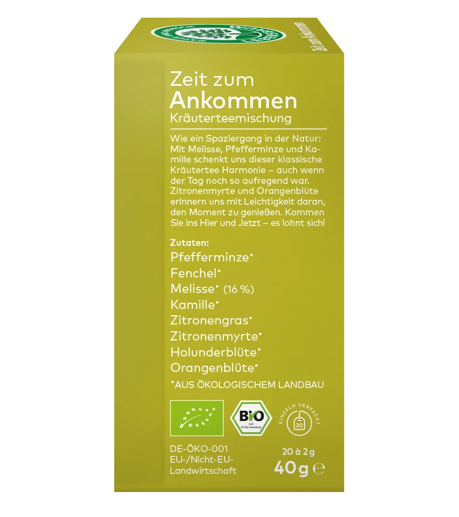linke Seite Verpackung einer Kräuter Gewürzteemischung ,,Zeit zum Ankommen" mit Zutatenangaben und Bio-Siegeln