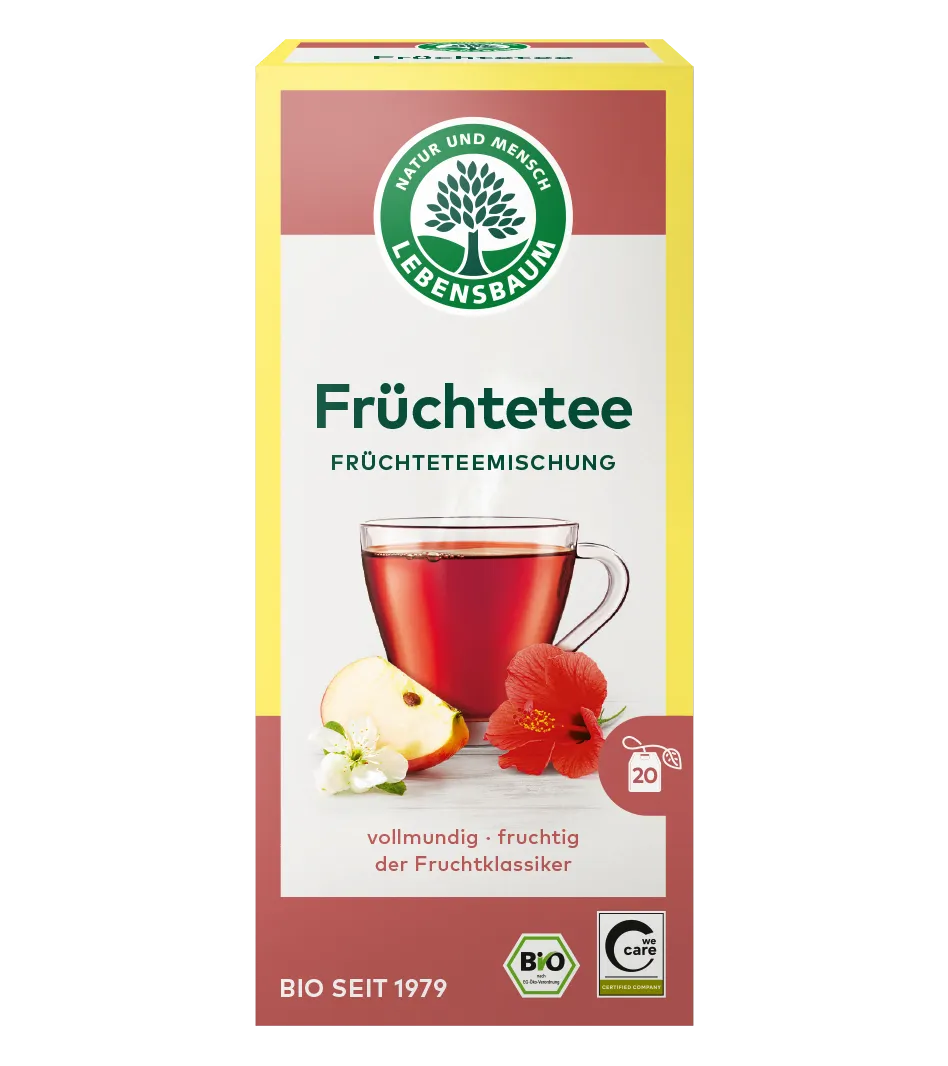 Lebensbaum Früchtetee Packung mit gelb-rotem Design, Tasse mit rotem Tee, Apfelstück und roter Hibiskusblüte, Bio-Zertifikat, 20 Teebeutel