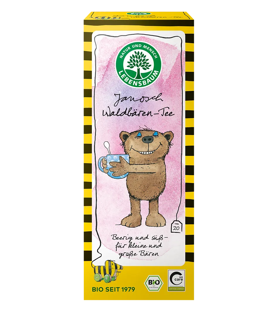 Lebensbaumtee Janosch Waldbären-Tee in gelb-schwarzer Kartonverpackung mit rosa Etikett, illustriertem Bär und 20 Teebeuteln, Bio-zertifiziert seit 1979.